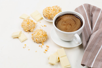 Cup of coffee and homemade sweets