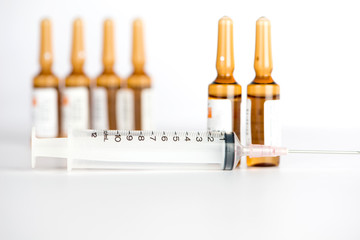 Injection syringe and Brown ampule