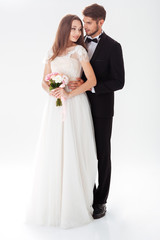 Full-length portrait of newlyweds
