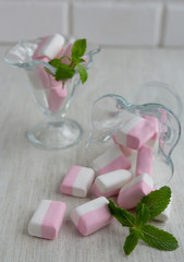 Sweets, Dessert marshmallow, candy in a glass on a light background
