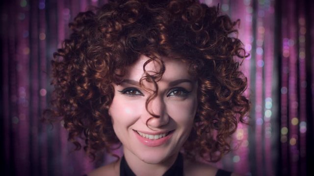 4k Disco Curly Sexy Woman Smiling Happy with Falling Confetti at Party