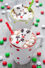 Christmas mugs hot chocolate with melted marshmallow reindeers