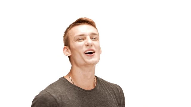 Young handsome man smiling, rejoicing, showing okay over white background.