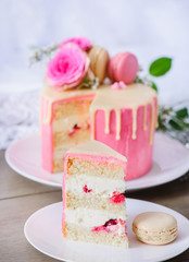 Biscuit cake with buttercream and raspberries