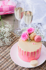 Pink cake and sparkling wine - 127695218