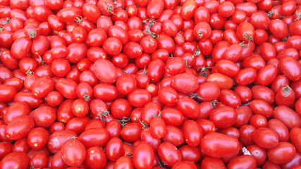 Fresh ripe red tomatoes background.