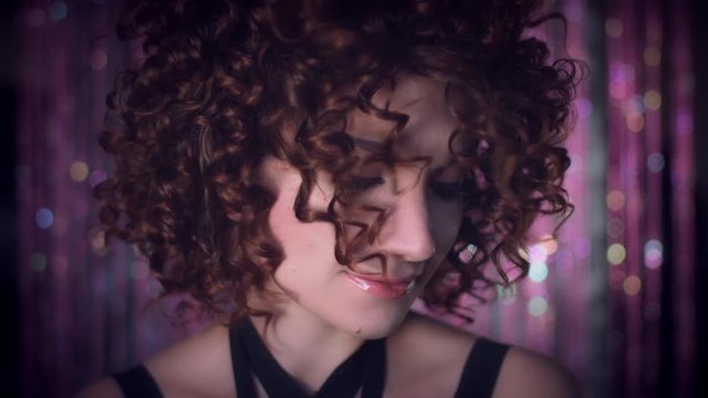 4k Disco Curly Sexy Woman Posing Sensual with Windy Hairs