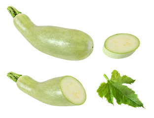 Collection of whole and sliced light green zucchini isolated on white background with clipping path