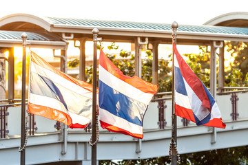 Thai Flag. The three Thai Flag Flab in the evening warm light.