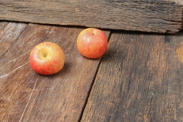 Red Apple Close up,select focus with shallow depth of field wooden floor background