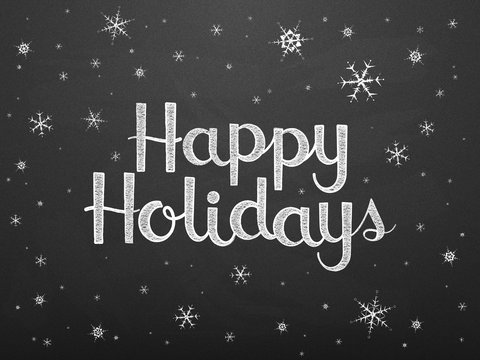 HAPPY HOLIDAYS in handdrawn font with falling snow on chalkboard