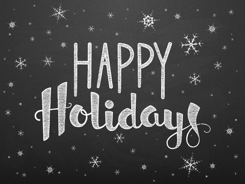 HAPPY HOLIDAYS in festive handdrawn font with falling snow on chalkboard