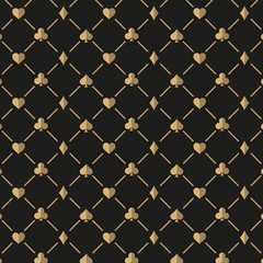 Fototapeta premium Poker and Casino. Golden card suits on a black background form a pattern for luxury background.