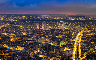 Aerial view of Paris, France at night.