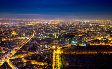 Aerial view of Paris, France at night.