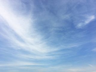 Fantastic soft white clouds against blue sky