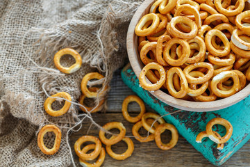 Bowl with salt bagels closeup.