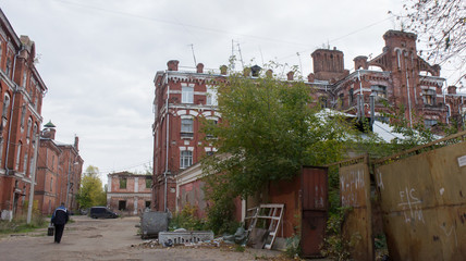 Partially destroyed and abandoned historical and architectural complex in Tver (Courtyard...