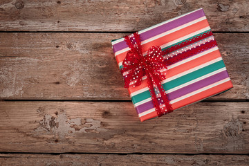 Fototapeta premium Vintage Christmas gift box on old wooden background.