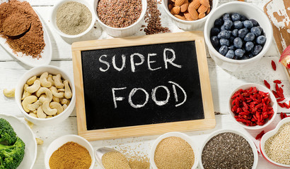 Best healthy Superfoods on a  wooden background.