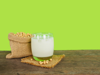 Soy beans and soy milk on wooden tabel for drinking everyday