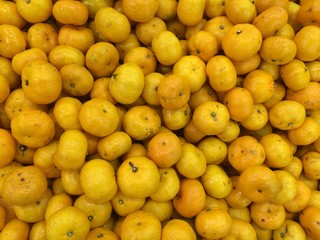 Small oranges fruit background / Mobile photography
