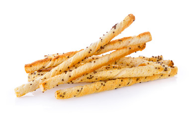 pile of delicious pretzel sticks isolated on white background