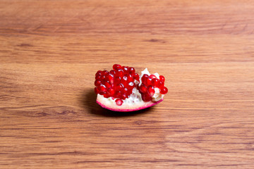 A slice of pomegranate. Useful and tasty fruit.
