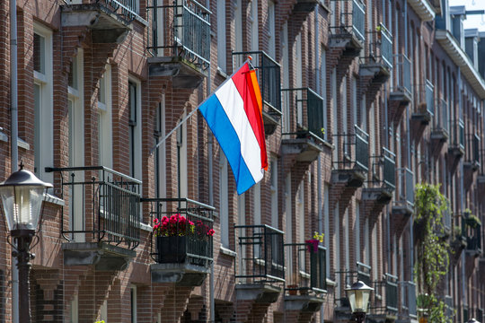 Dutch flag on a Amsterdam house on Kingsday