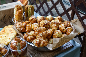 Freshly baked sweet buns or bread rolls at the market