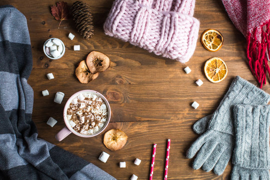 winter still life: hat, gloves, hot chocolate with marshmallows