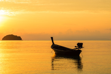 Fishing boat in sunrise