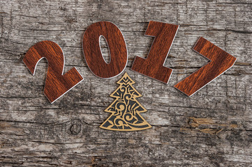 Sign symbol from number 2017 on old retro vintage style wooden b