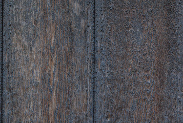 Old burned damaged wood