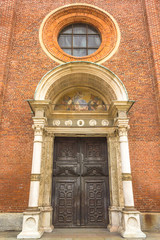 door of the Milan's famous church Santa Maria Delle Grazie, Saint Mary, hosting in it's refectory,...