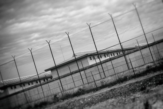 Correctional Facility outside the fence. Black and white.