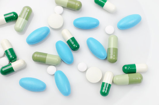 Blue and green pills