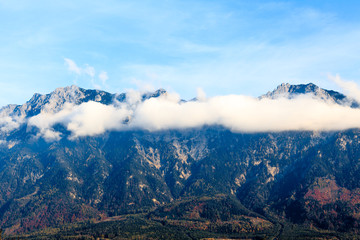 Clouds on mountain tops.  Mountain landscape with clouds. mounta