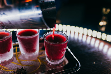 cranberry cocktail with mint garnish.