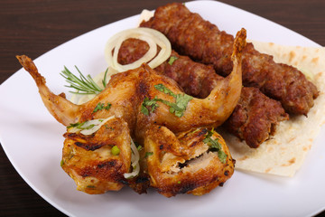 Beef kebab and grilled Quail