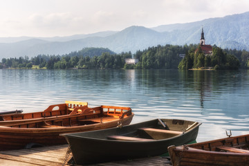Pleasure boats on the beautiful alpine lake background, Bled, Slovenia