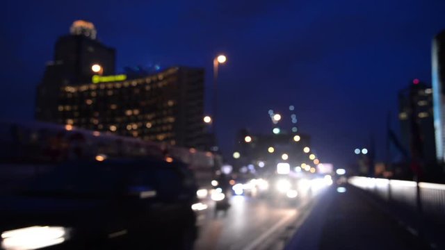 traffic light trails in modern city at night