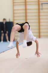 Obraz premium Gomel, Belarus - 19 November 2016: Sports competitions in acrobatics among boys and girls born in 2005-2006