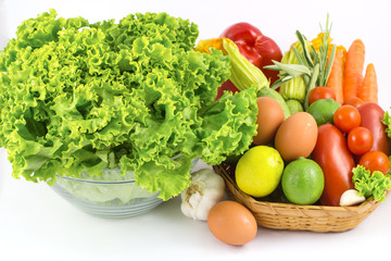 Fresh vegetables mix isolated on white /  fresh vegetable with leaves on white background / fresh vegetables with leaves in the basket isolated on white background / Fresh vegetables .