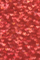 defocused abstract red hearts light background