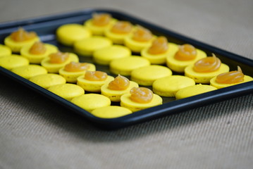 Obraz na płótnie Canvas macarons in baking tray