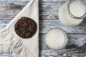 Cookies and Milk / Top View of Cookies and Milk on a Wooden Background