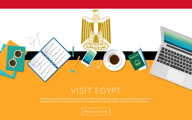 Visit Egypt concept for your web banner or print materials. Top view of a laptop, sunglasses and coffee cup on Egypt national flag. Flat style travel planninng website header.