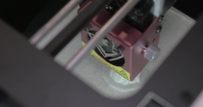 Top close-up view of mechanism of 3d printer in process