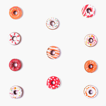 Delicious Bright Donuts on the white background.
